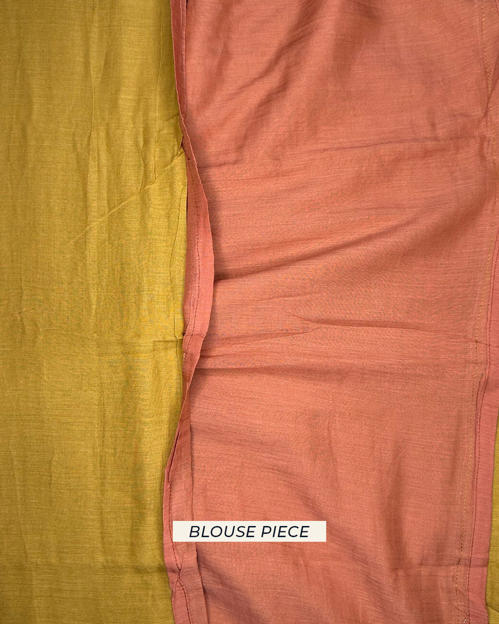 Contrasting rust-toned unstitched blouse piece fabric for the Rajathee Saree Mustard Yellow Mul Cotton collection.