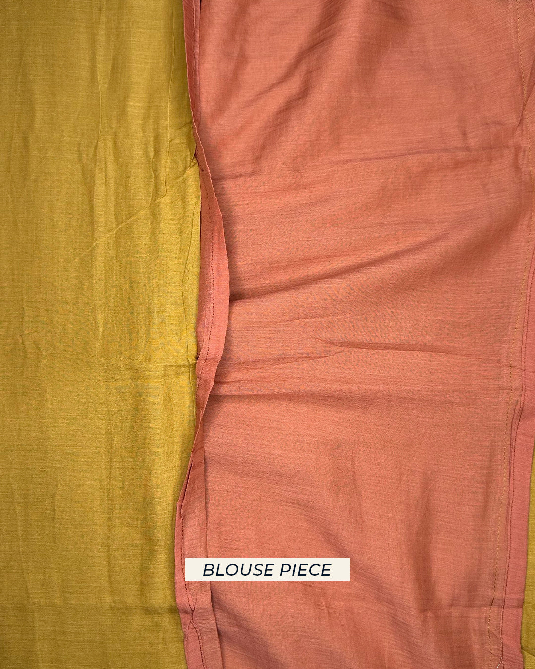 Contrasting rust-toned unstitched blouse piece fabric for the Rajathee Saree Mustard Yellow Mul Cotton collection.