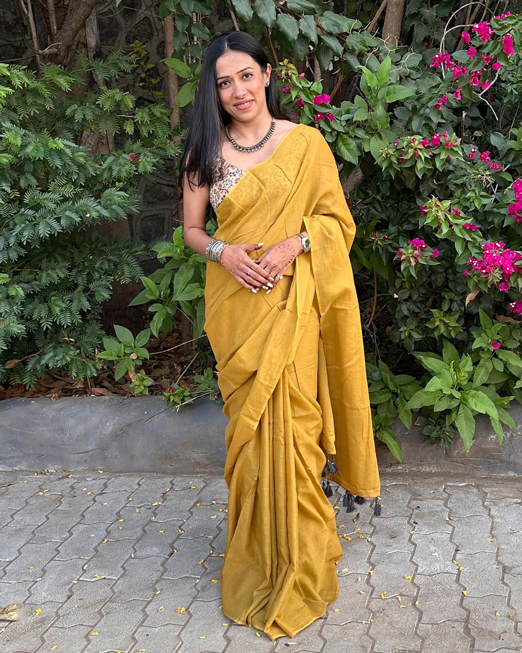 Rajathee Saree Mustard Yellow Mul Cotton Saree featuring a plain, minimalist design and ultra-lightweight drape.