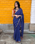 Rajathee Saree Deep Blue Mul Cotton Saree featuring a minimalist gold border and ultra-lightweight drape.