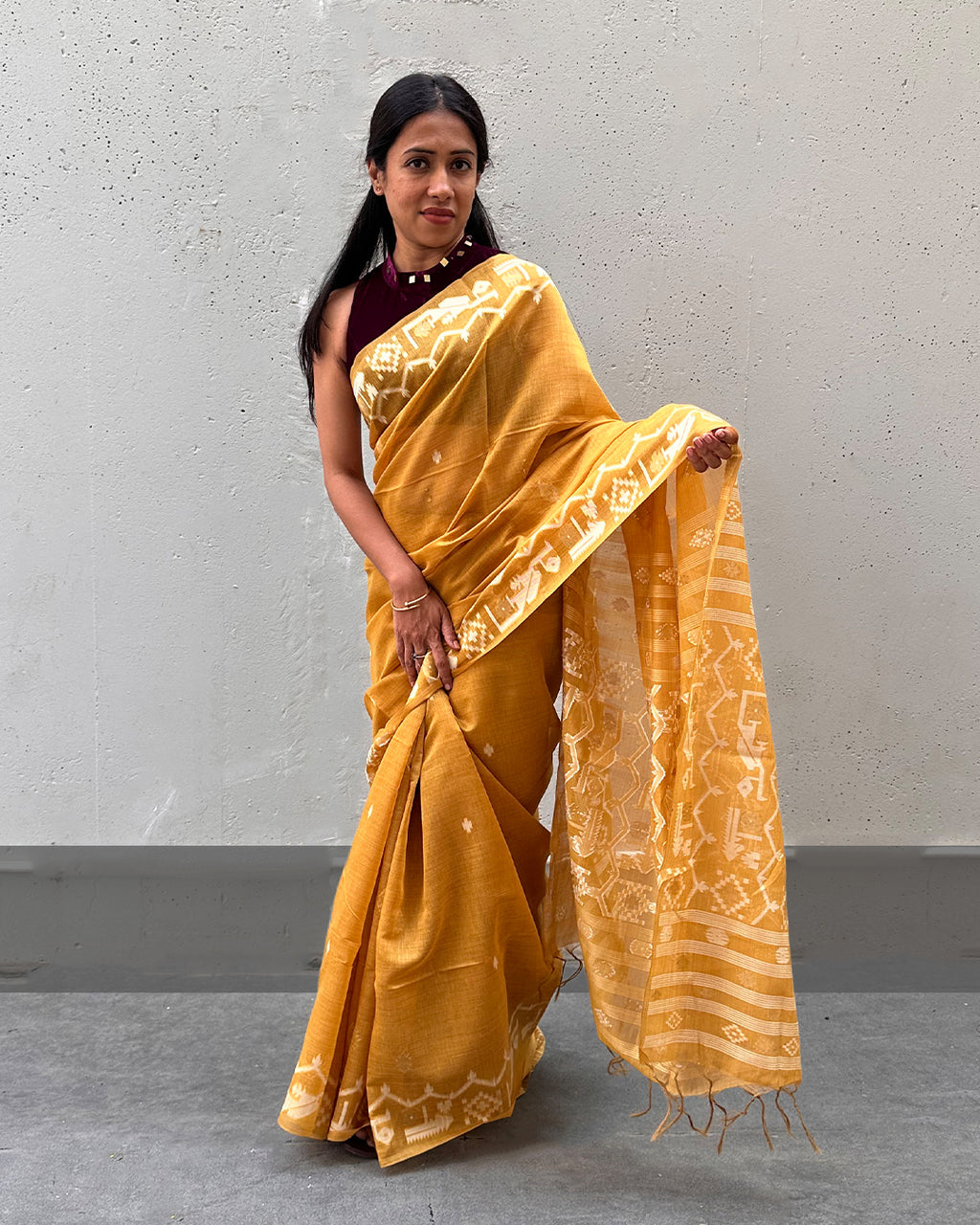 Rajathee Saree Mustard Yellow Tussar Silk Saree featuring a modern geometric line pattern and structured drape.