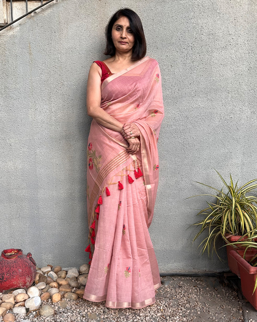 Rajathee Saree Blush Pink Tussar Silk Saree featuring floral motifs and a modern geometric influenced border.