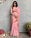 Rajathee Saree Blush Pink Tussar Silk Saree featuring floral motifs and a modern geometric influenced border.