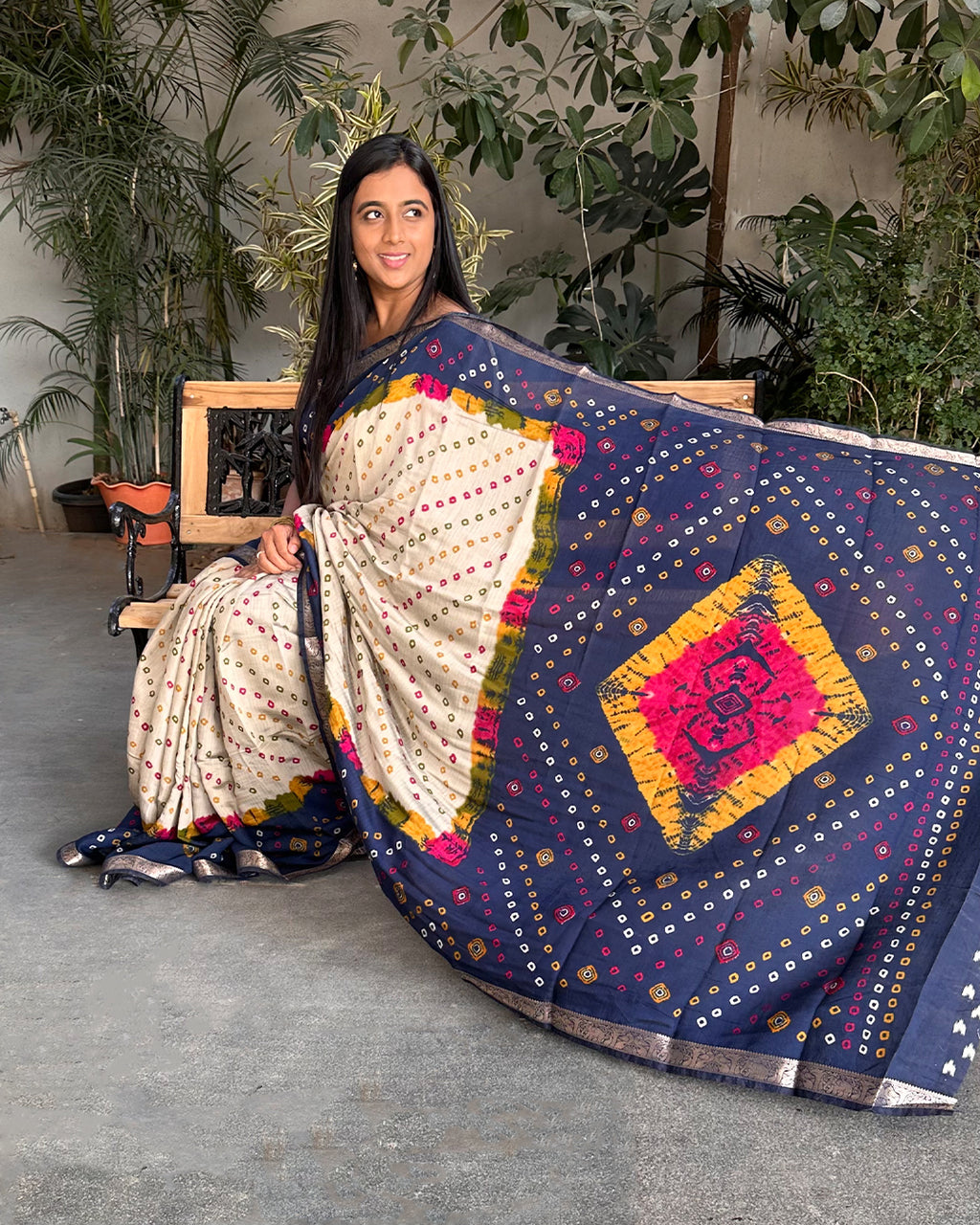 Spread view of the Ivory and Blue Cambric Silk Saree showing the multicolour Bandhani diamond motifs on the pallu.