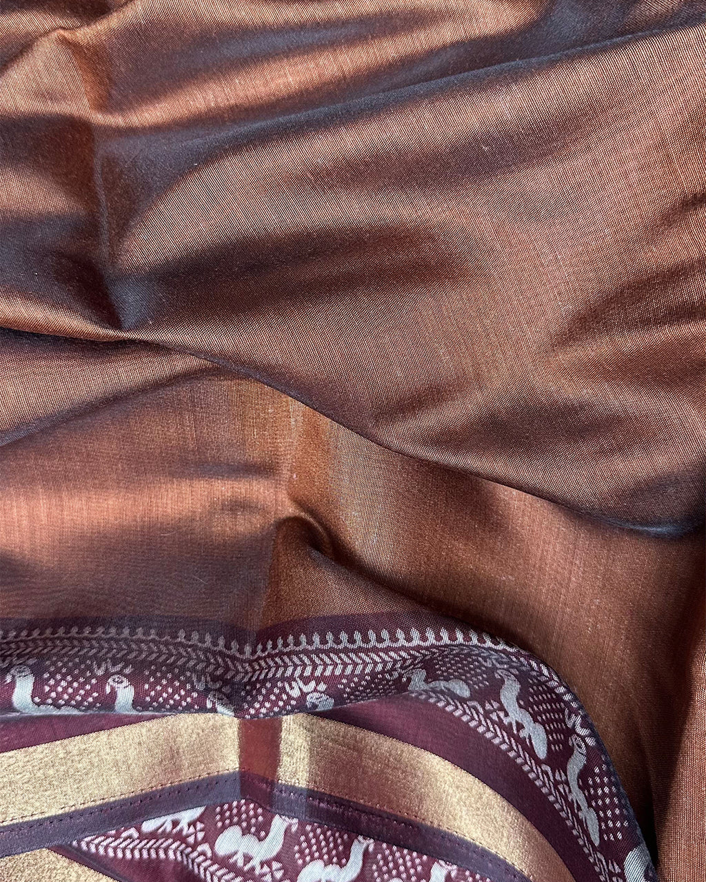 Close-up of the smooth Earthy Brown Cambric Silk fabric showing the subtle sheen and lightweight weave.