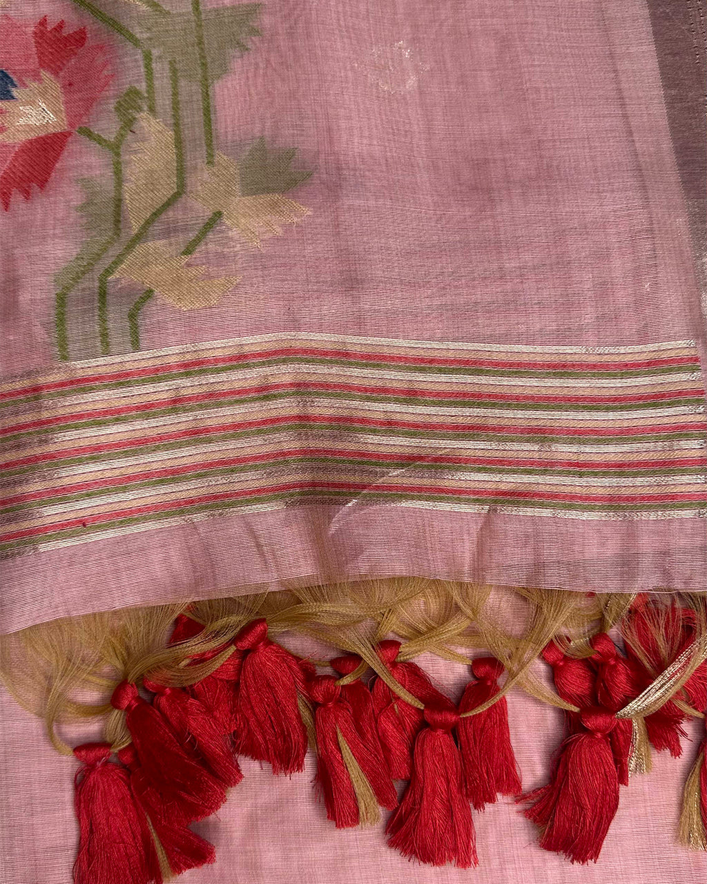 Close-up of the floral motifs, geometric border, and soft sheen of the Blush Pink Tussar Silk fabric.