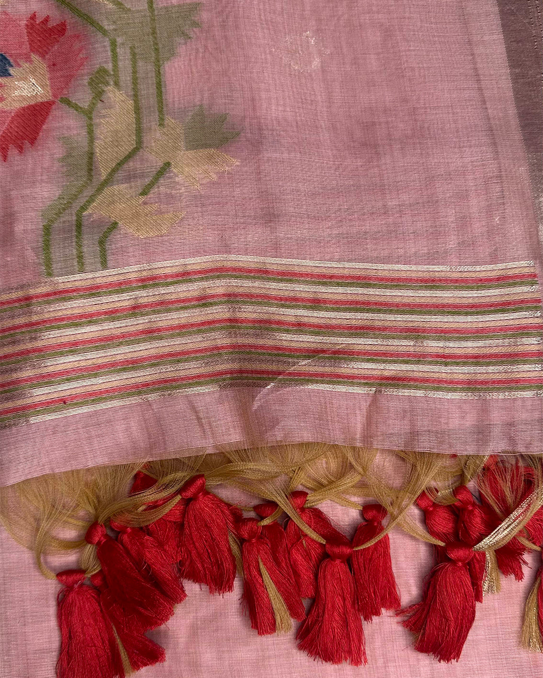 Close-up of the floral motifs, geometric border, and soft sheen of the Blush Pink Tussar Silk fabric.