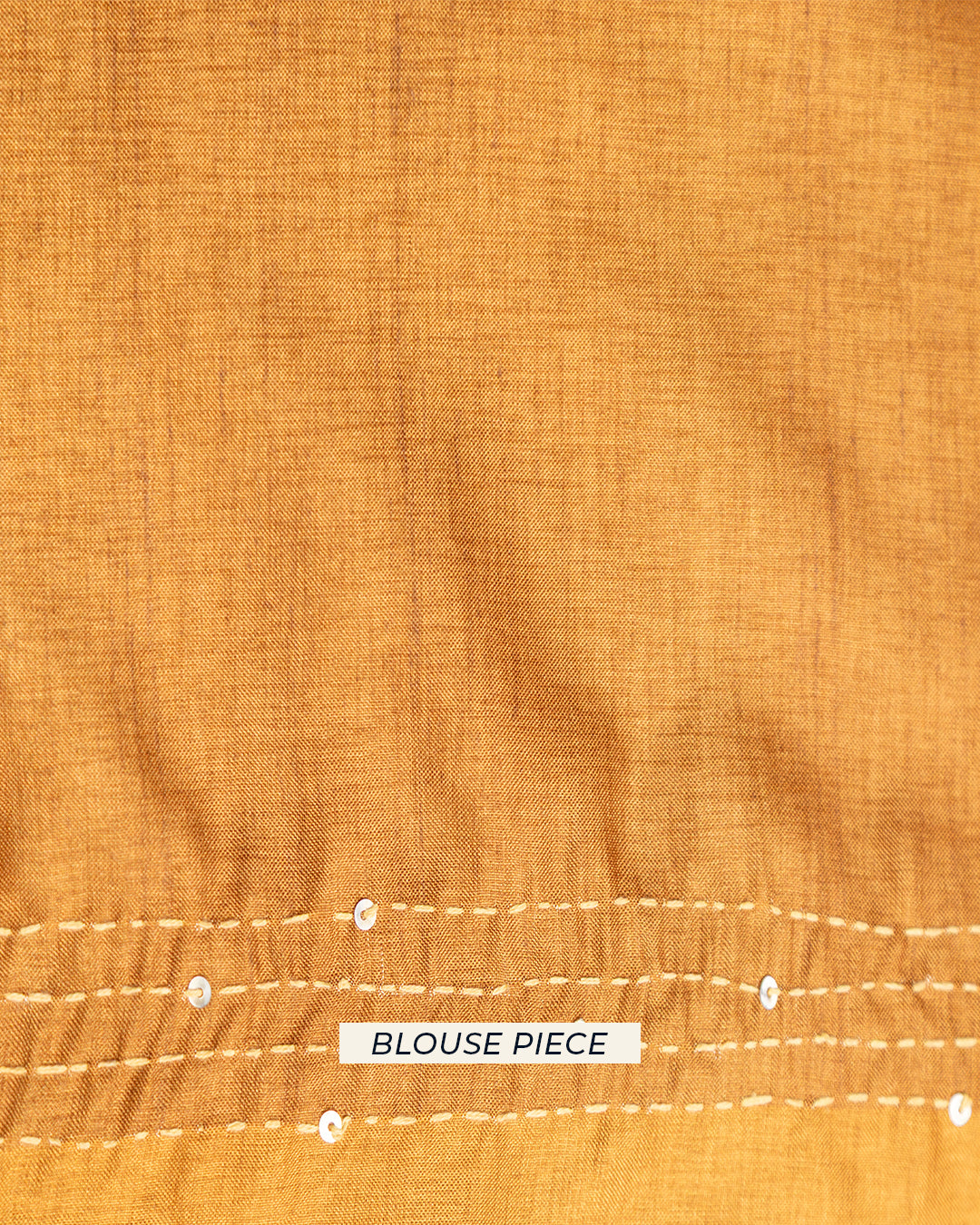 Matching unstitched blouse piece fabric with a soft sheen for the Rajathee Saree Mustard Beige botanical collection.