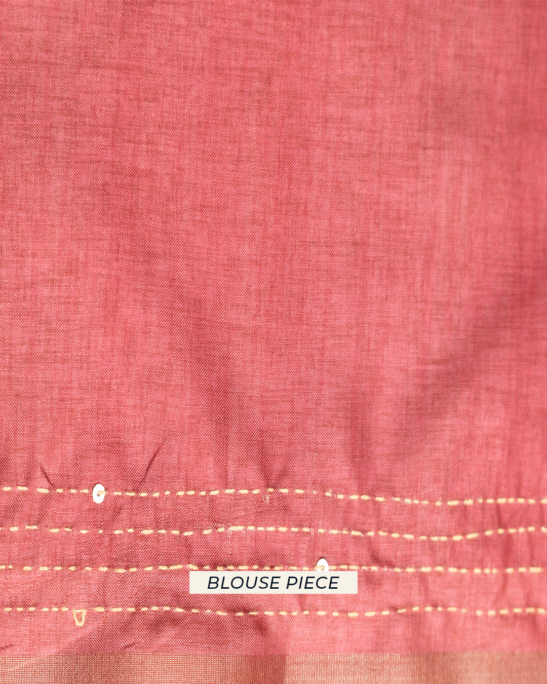 Coordinating Blush Pink unstitched blouse piece fabric with subtle textured accents for the Rajathee Saree collection.