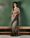 Rajathee Saree Shadow Floral Saree featuring a muted grey and brown base with large, moody botanical prints and a sheer drape.