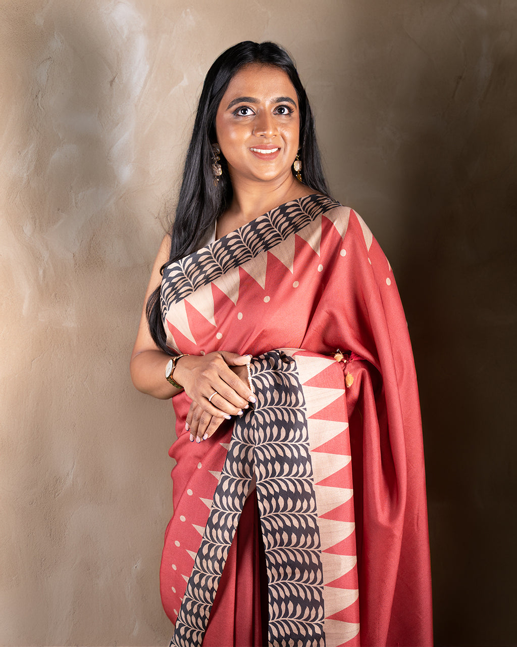 Elegant front drape of the Red Raw Silk Cotton Saree by Rajathee Saree showcasing its structured texture and sophisticated fall.
