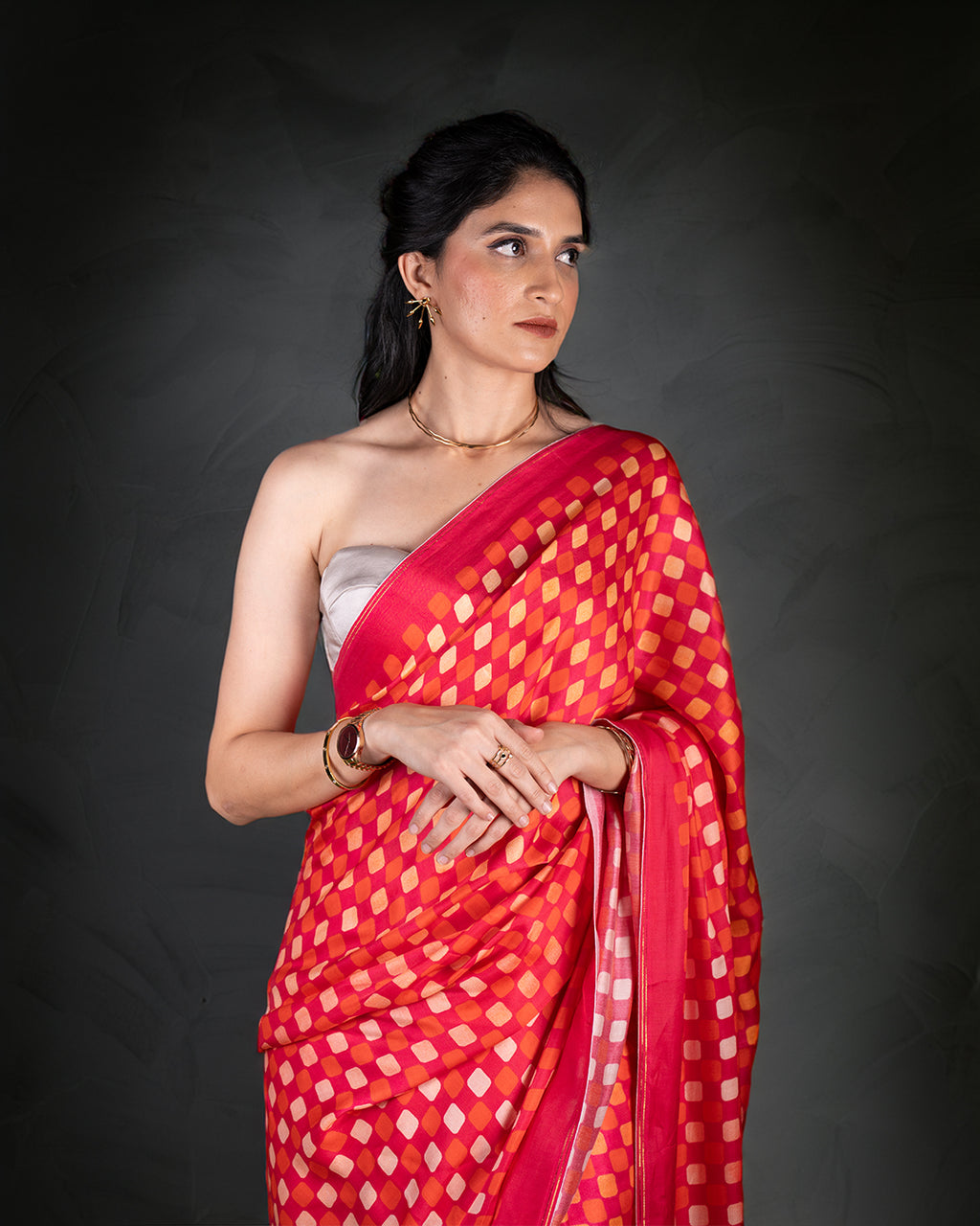 Elegant front view of the Crimson Red Queen's Grid Saree by Rajathee Saree showcasing its fluid and smooth fall.