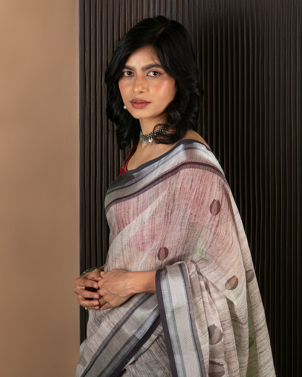 Elegant portrait of the Grey Cotton Saree by Rajathee Saree showcasing its breathable texture and lightweight drape.