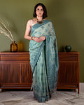 Rajathee Saree Sea Green Cotton Saree featuring Warli-inspired stone age motifs and a lightweight, breathable drape.