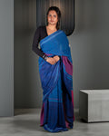 Rajathee Saree Blue Mul Cotton Saree featuring a vibrant pink contrast pallu and lightweight drape.