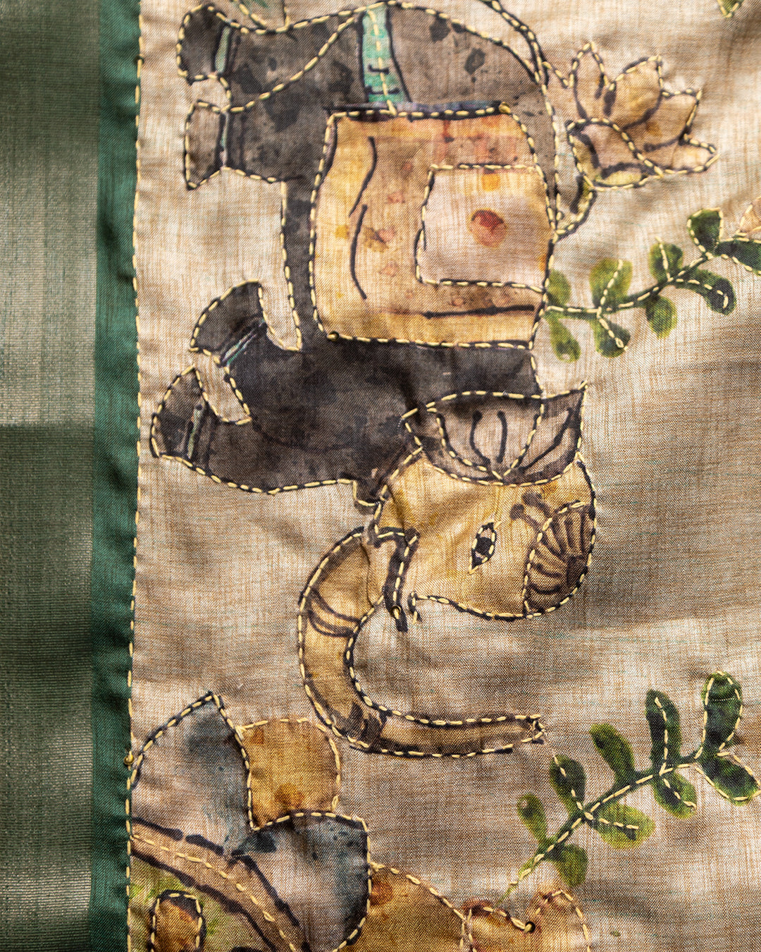 Detailed view of the contrasting Bottle Green border and soft shimmer of the Cotton-Tissue fabric.