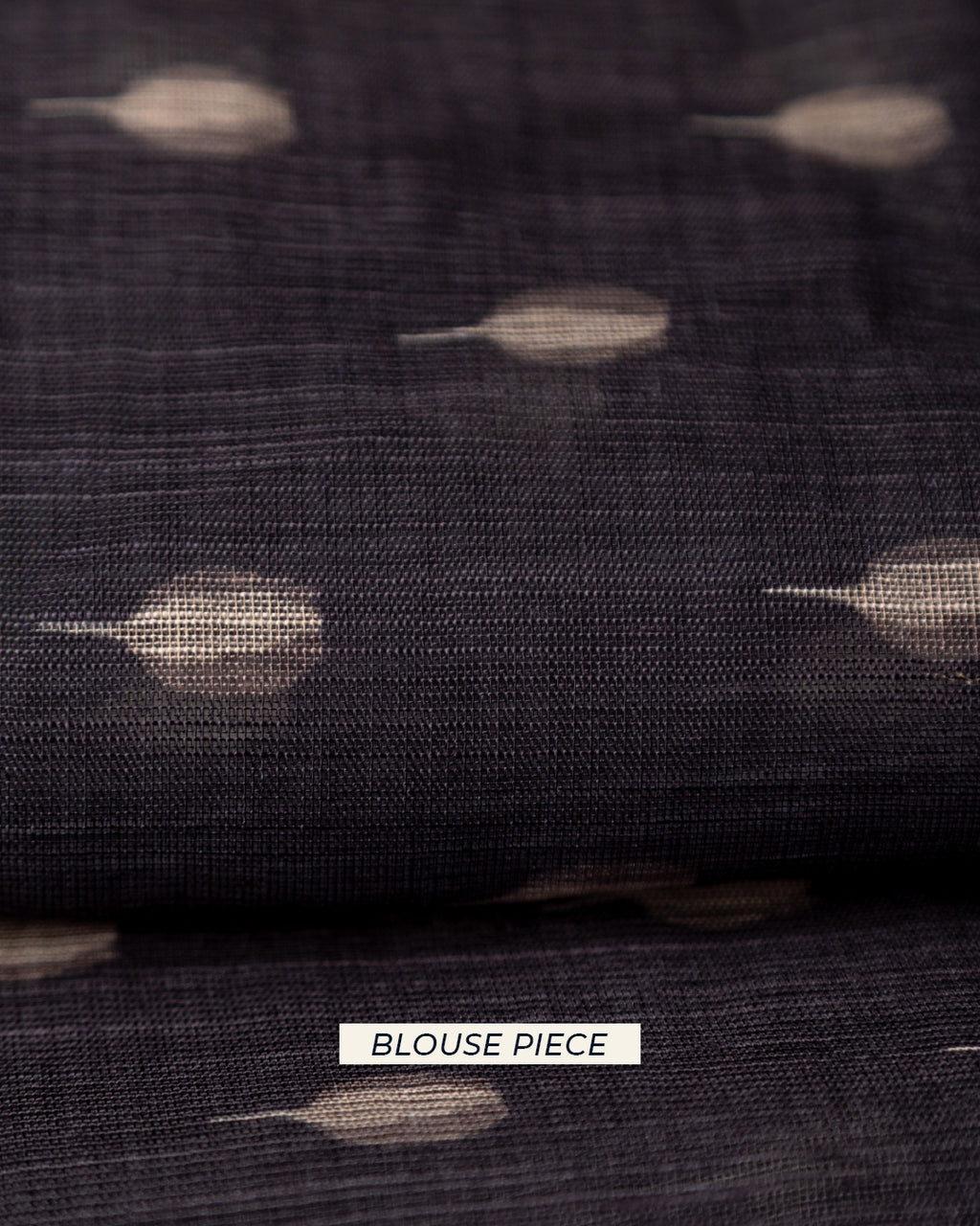 Matching dark grey unstitched blouse piece fabric with leaf-like motifs for the Rajathee Saree Cotton collection.
