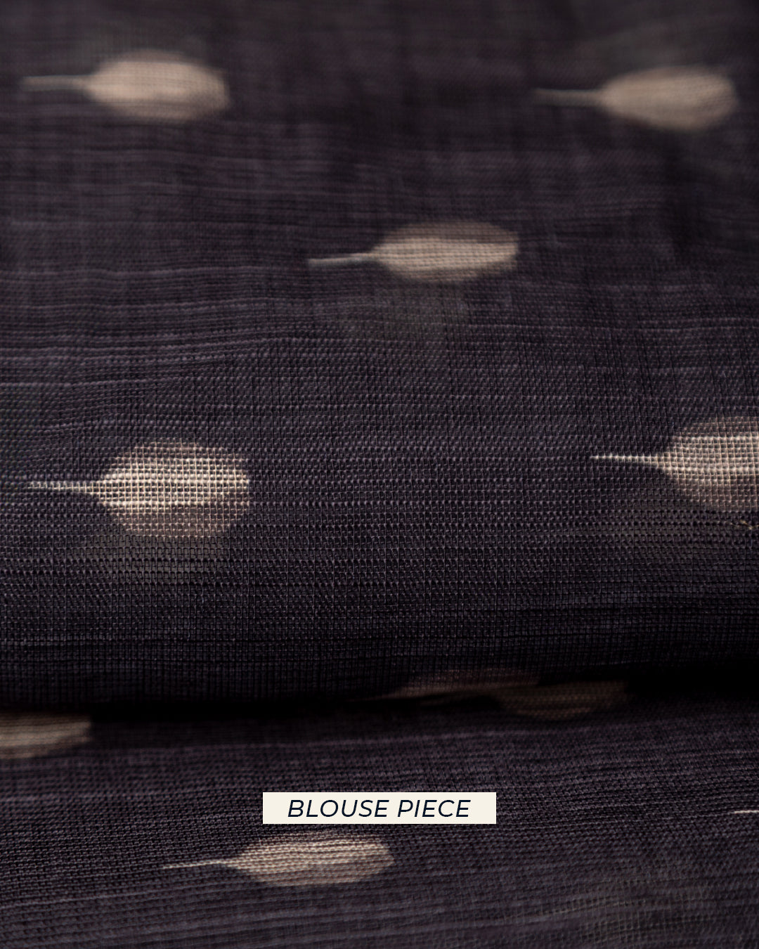 Matching dark grey unstitched blouse piece fabric with leaf-like motifs for the Rajathee Saree Cotton collection.