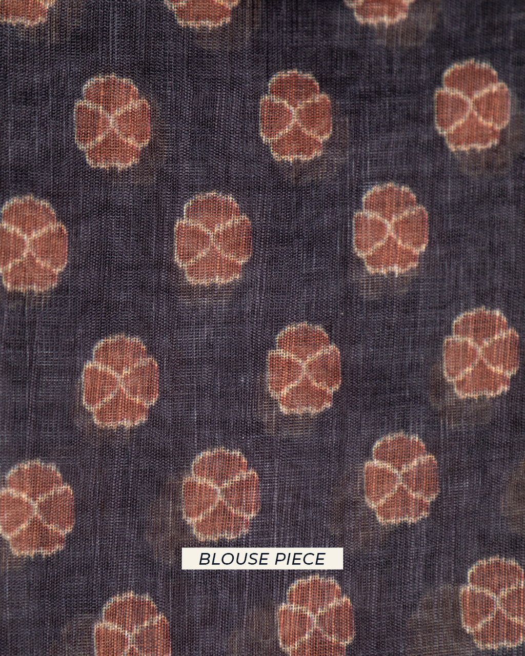 Matching dark grey unstitched blouse piece fabric with circular motifs for the Rajathee Saree Cotton collection.