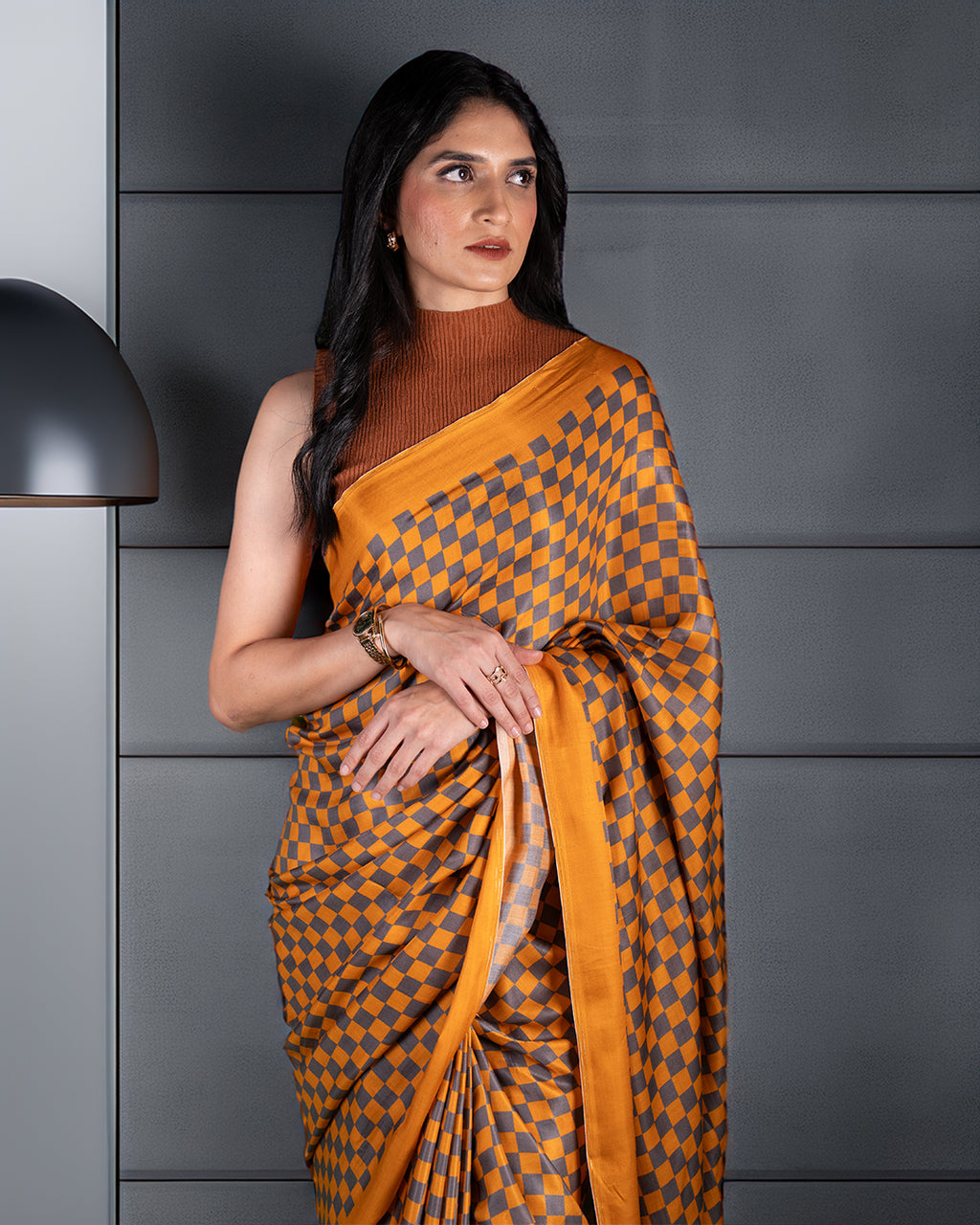 Elegant front view of the Mustard Yellow Queen's Grid Saree by Rajathee Saree showcasing its glossy, fluid drape.