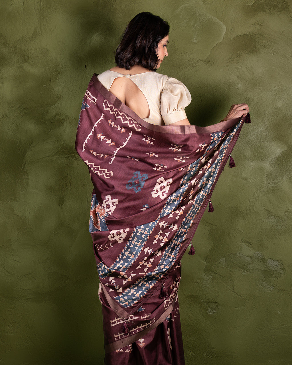 Rear view of the Brown Cotton-Tissue Saree showcasing the detailed print and lightweight, breathable fabric fall.