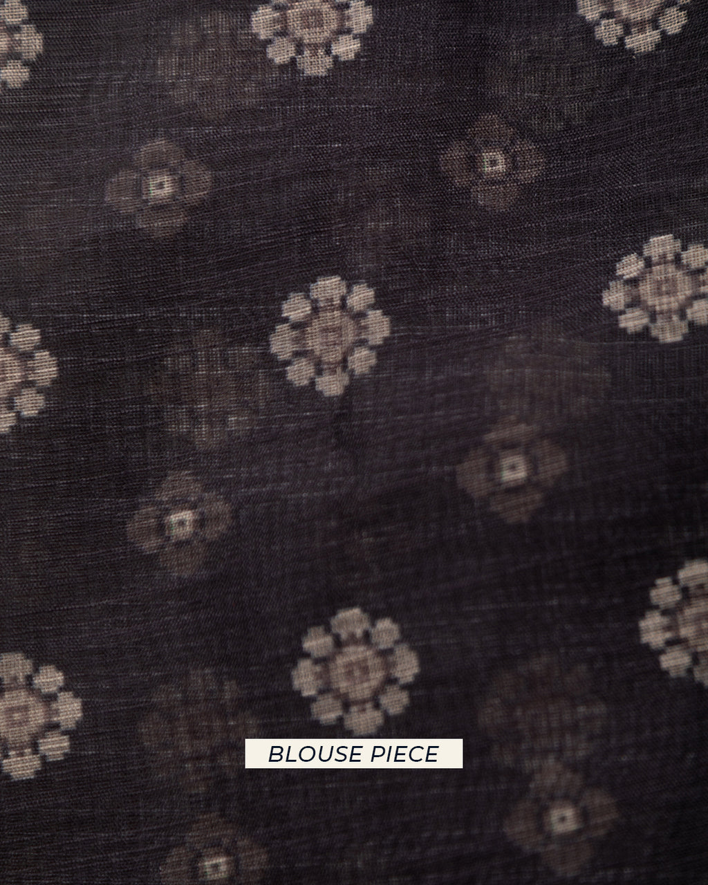 Matching dark grey unstitched blouse piece fabric with delicate floral motifs for the Rajathee Saree collection.