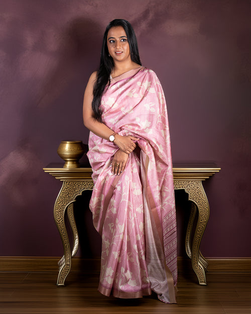 Rajathee Saree Baby Pink Cotton-Tissue Blend Saree featuring woven floral motifs and a subtle gold-toned border.