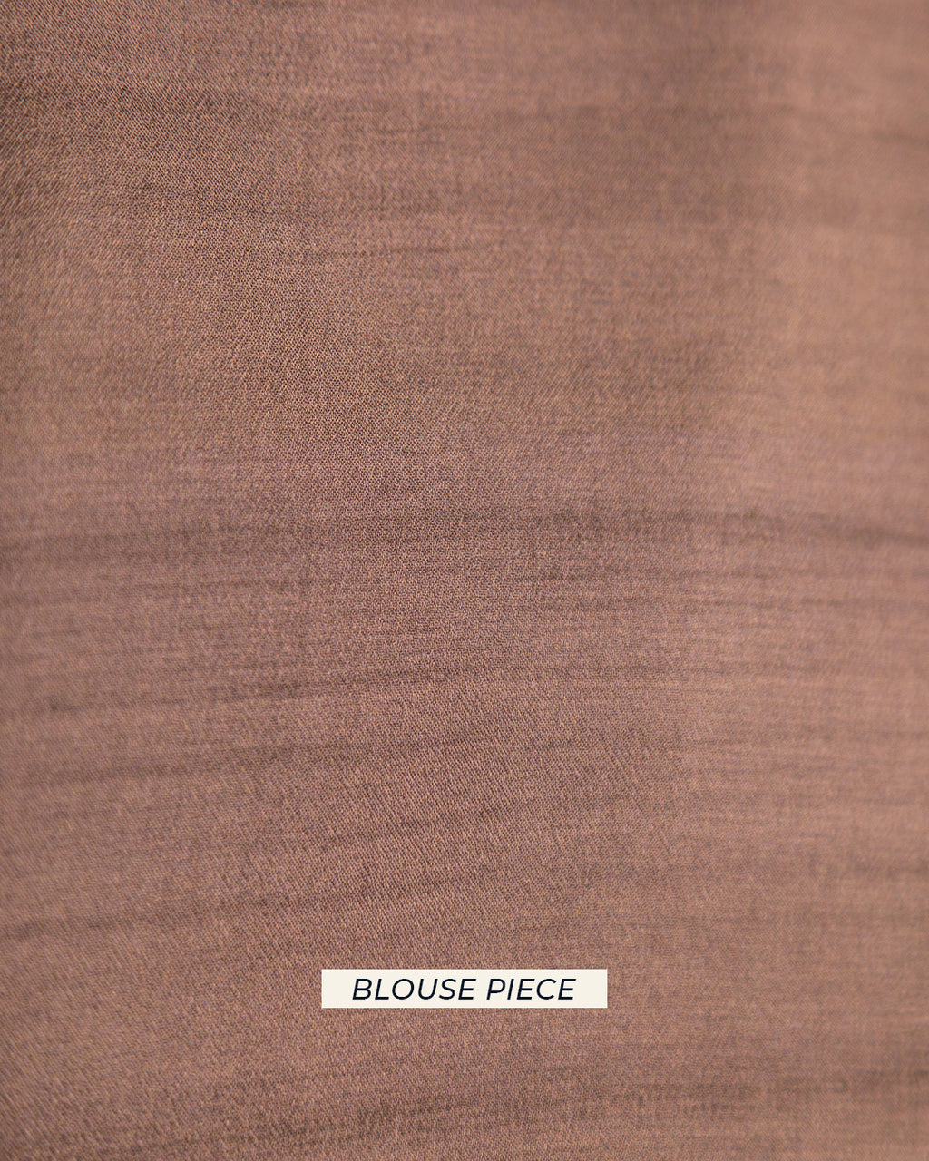 Matching solid rust-toned unstitched blouse piece fabric for the Rajathee Saree Silk Georgette collection.