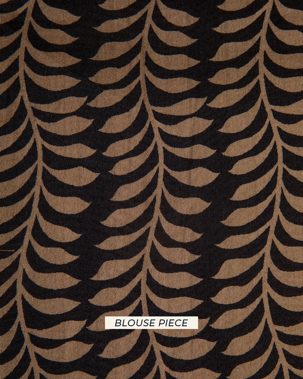 Matching black unstitched blouse piece fabric with a sophisticated leaf-patterned weave for the Rajathee Saree collection.