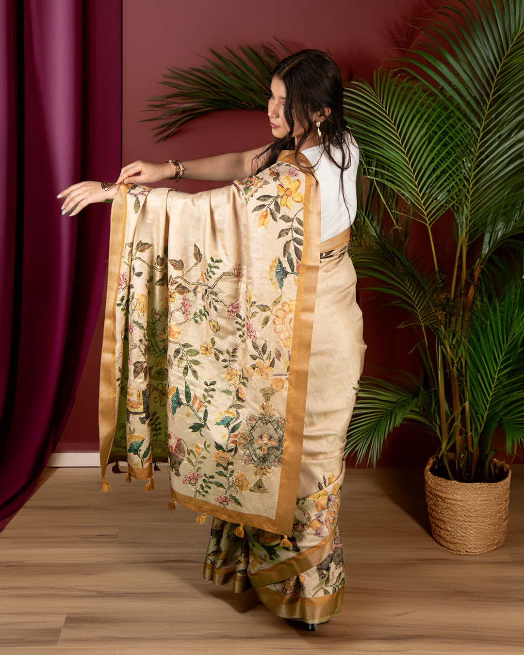 Elegant showcase of the detailed botanical narrative pallu on the Mustard Beige Cotton-Tissue Saree by Rajathee Saree.