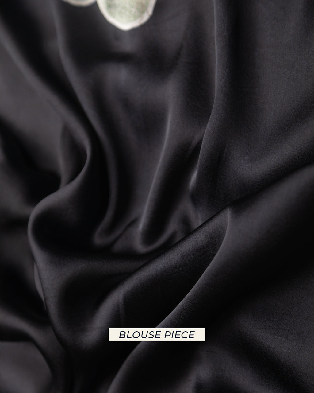 Elegant Zara Beauty crepe saree by Rajathee Sarees, featuring intricate draping and vibrant color details.