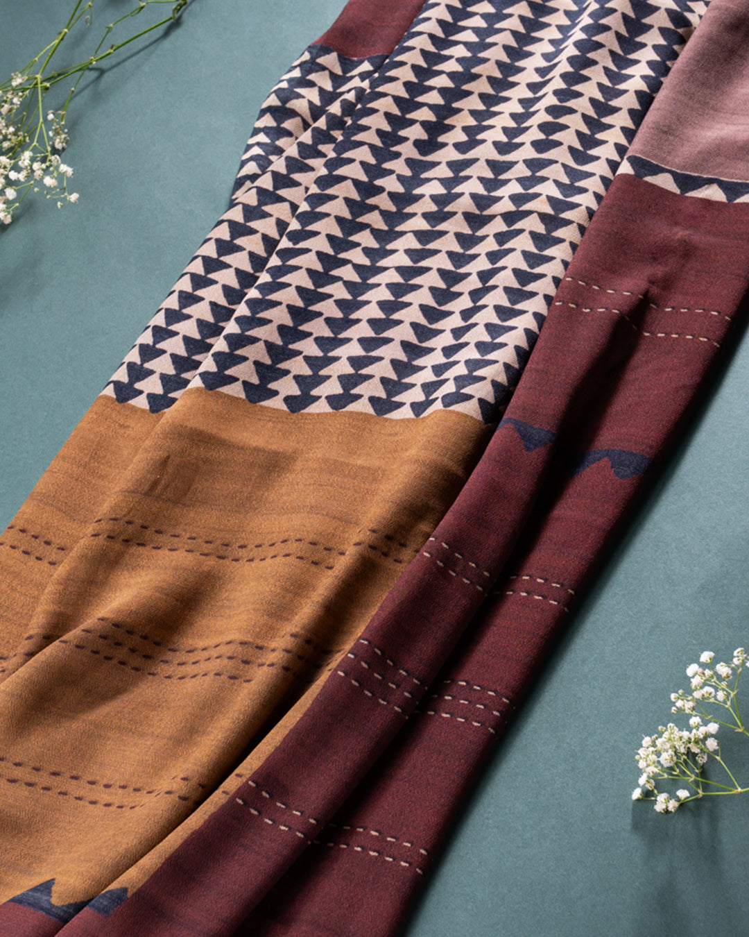 Detailed view of the various print sections and soft texture of the Rajathee Saree Silk Georgette collection.