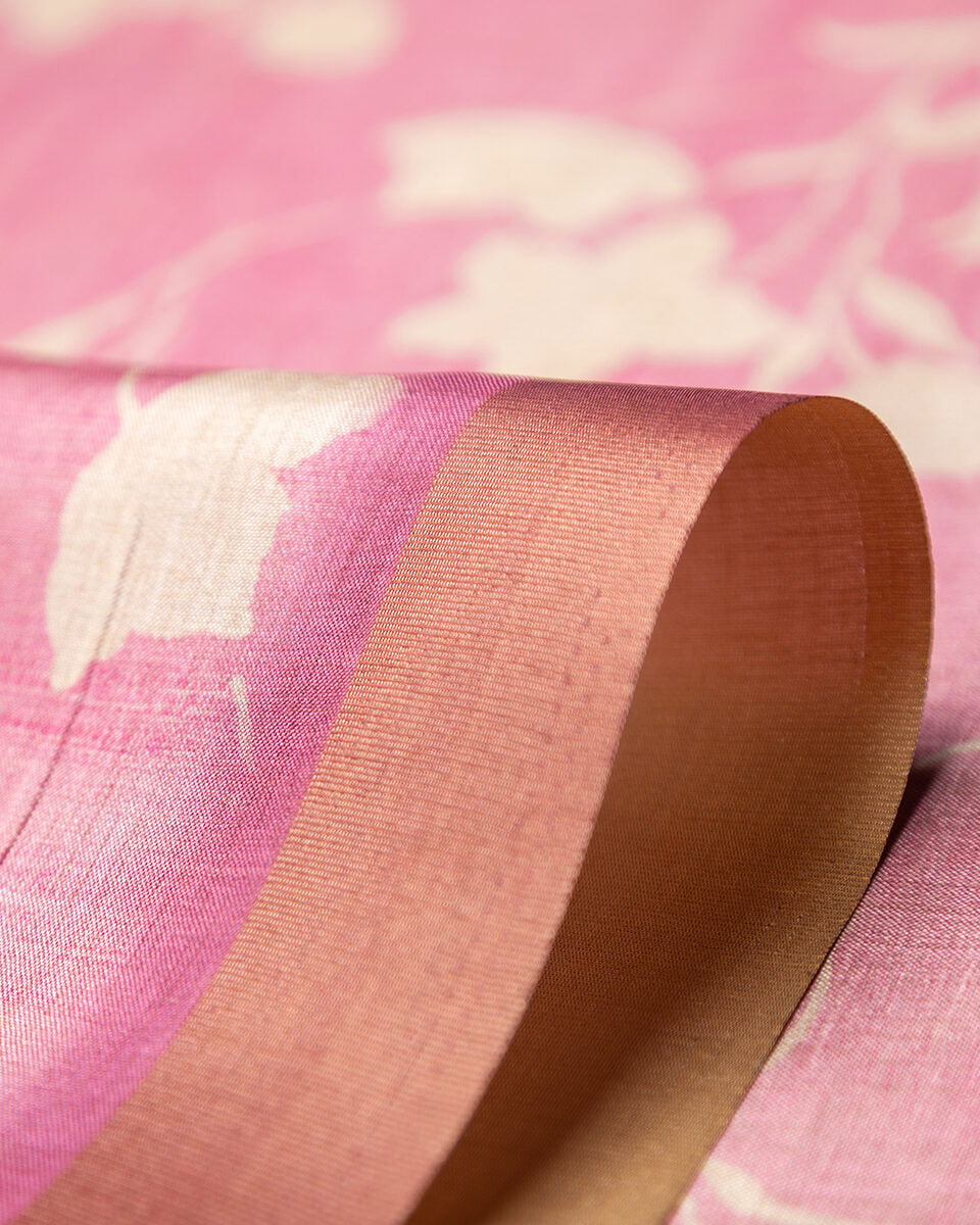 Detailed view of the subtle gold-toned border and delicate fabric folds of the Rajathee Saree Baby Pink collection.
