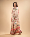 Rajathee Saree Blush Pink Cotton Tissue Saree featuring an intricate botanical narrative print and a soft, graceful sheen.