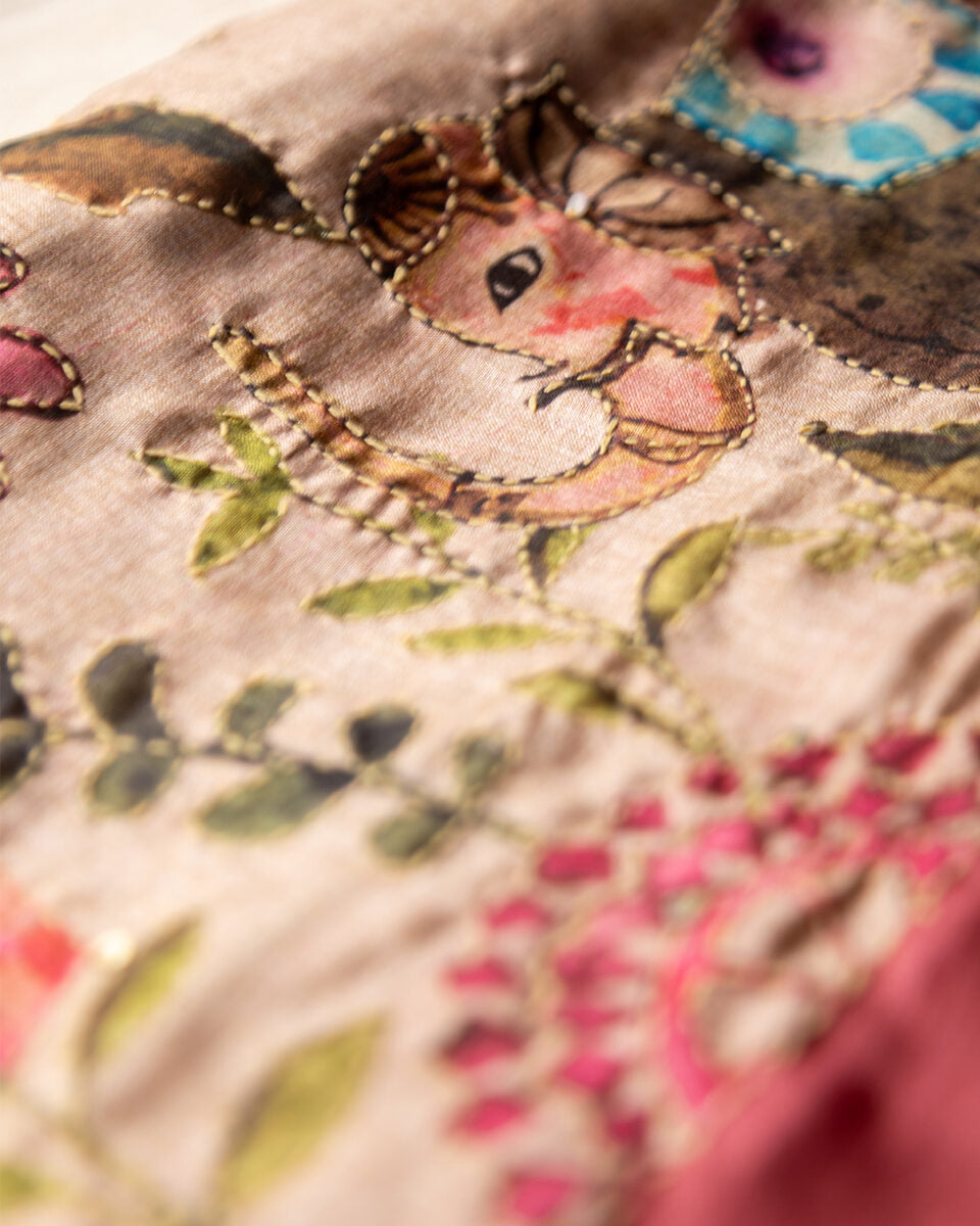 High-definition detail of the botanical print and breathable Cotton Tissue fabric of the Blush Pink Rajathee Saree.