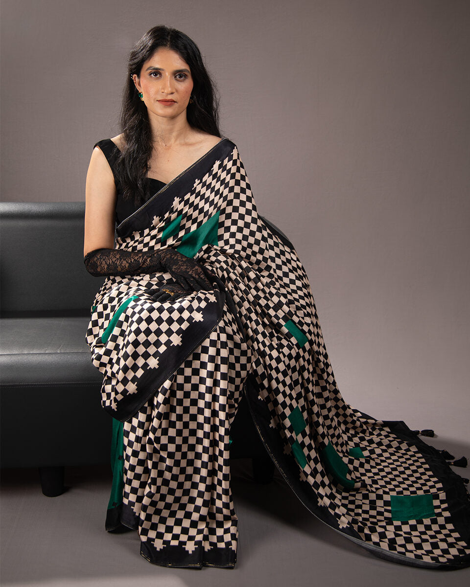 Rajathee Saree Emerald Green Queen's Grid Saree in Modal Satin featuring a bold black and white checkered pattern.