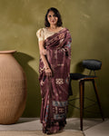 Rajathee Saree Brown Cotton-Tissue Blend Saree featuring intricate traditional motifs and a structured, elegant drape.