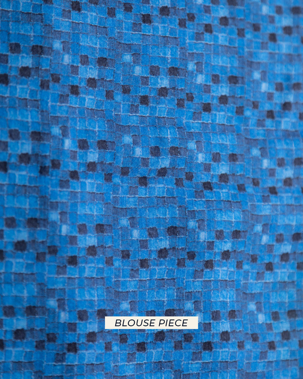 Matching sky blue unstitched blouse piece with a micro-checkered pattern for the Rajathee Saree collection.